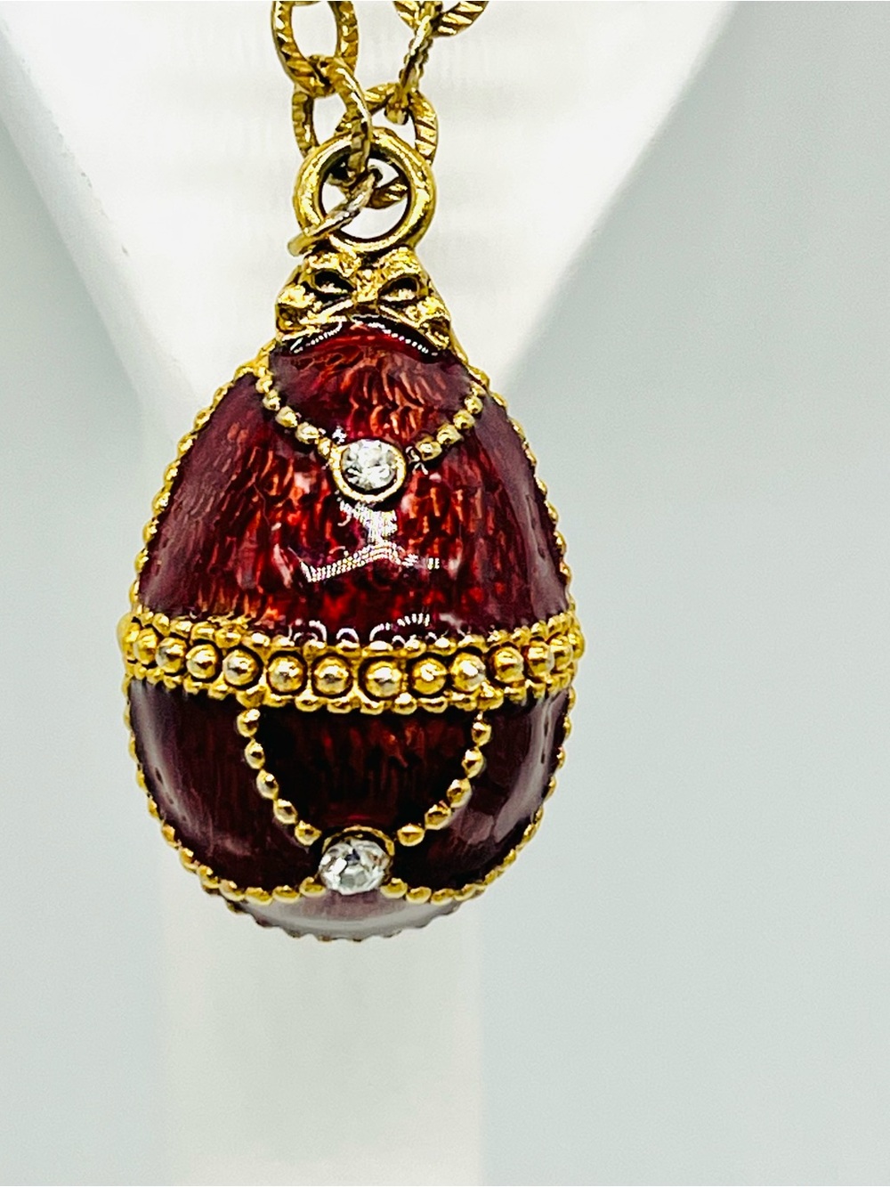373. Fabergé Style Caramel Red Guilloche’ Egg Pendant Necklace Crystal Accents